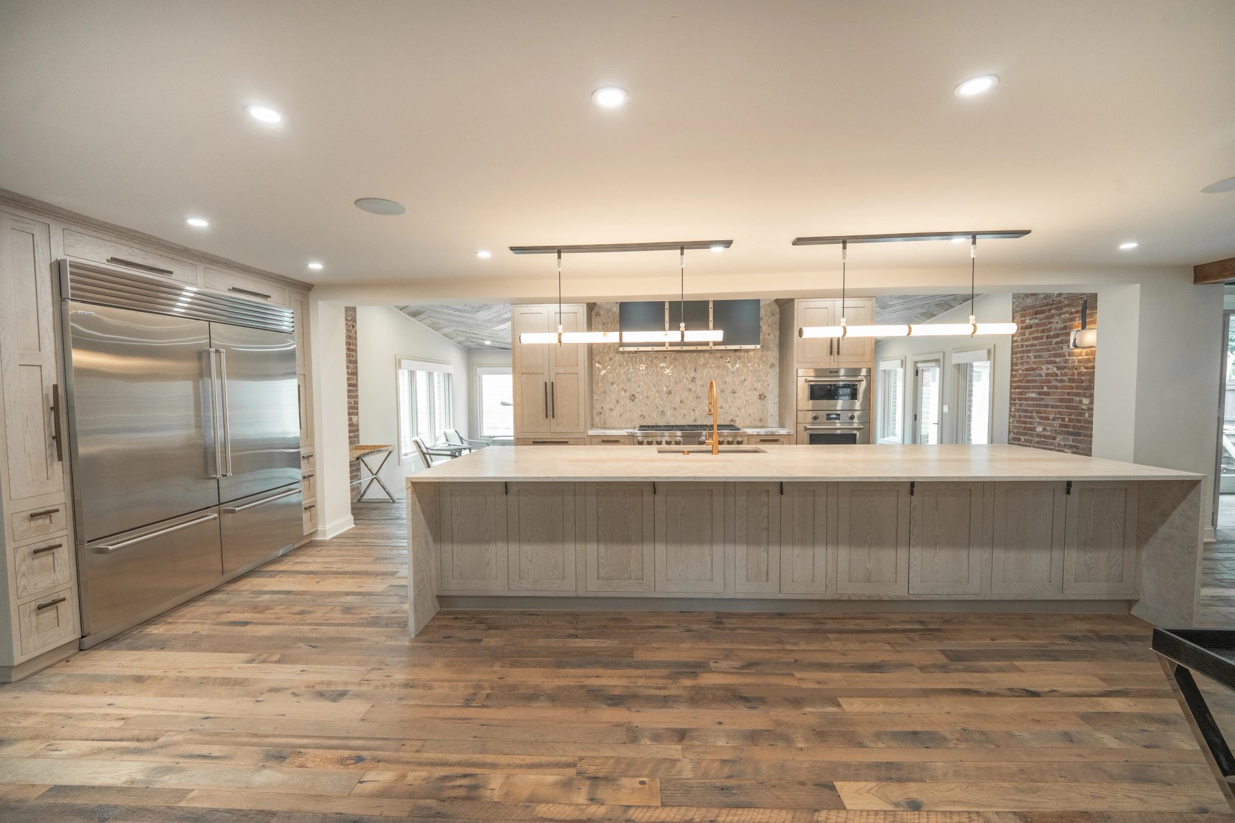 Hart Townhouse kitchen with cabinetry and stone surfaces